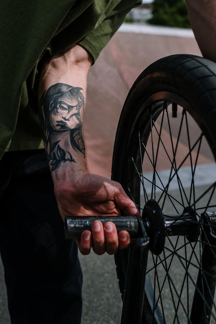 Man Fixing A Tire