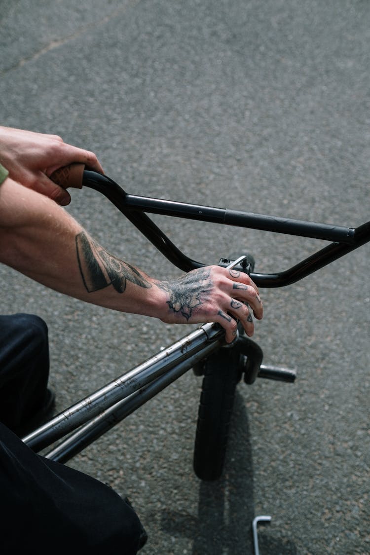 Man Fixing A Bike 