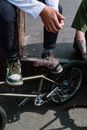 A Person in Green Sneakers