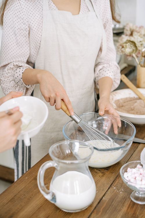 A Person Baking at the Table · Free Stock Photo