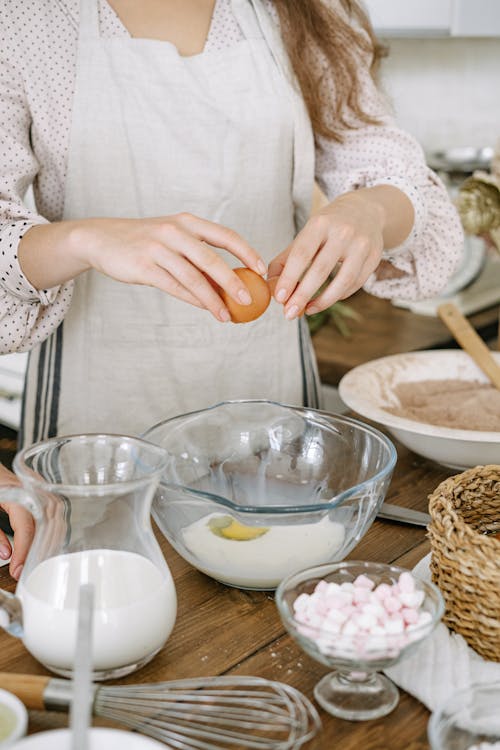 A Person Holding an Egg