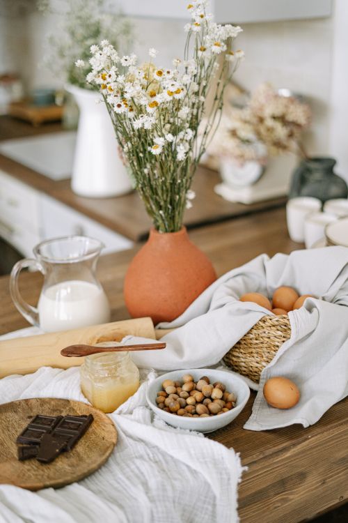 Free A cozy still life depicting baking preparation in a rustic kitchen setting. Stock Photo