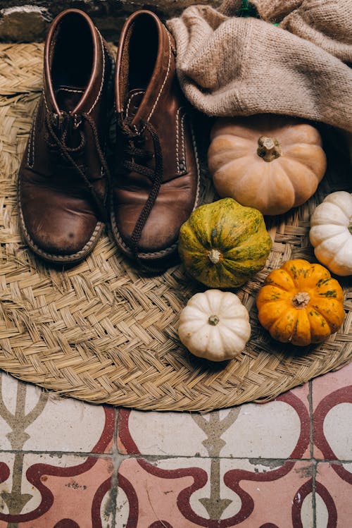Pumpkins Beside the Brown Leather Shoes