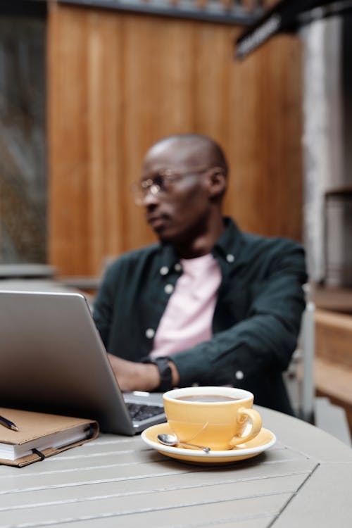 A Man Sitting at the Table