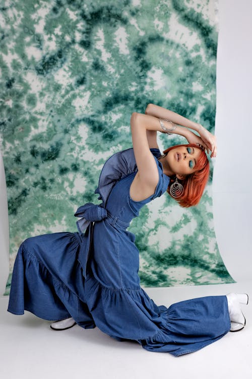 A Woman in Blue Denim Dress
