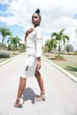Woman in White Dress Standing on Gray Asphalt Road