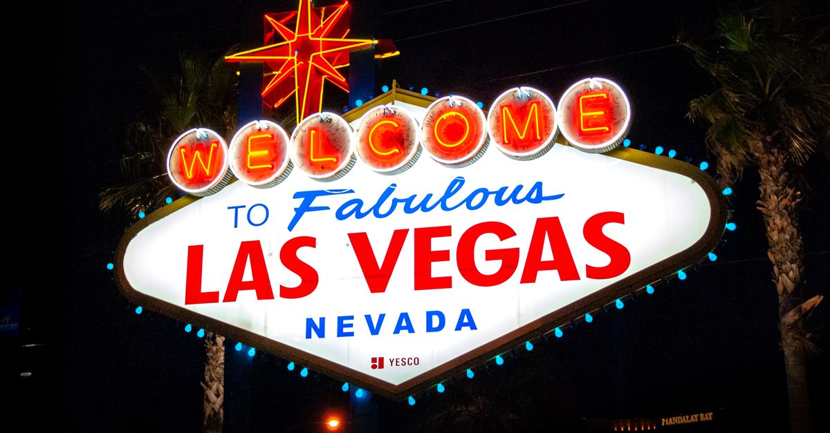 The iconic Welcome to Fabulous Las Vegas sign illuminated at night, representing the city's vibrant tourism.