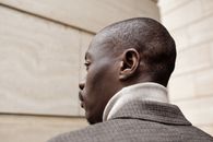 Close-up of a Man Looking Over his Shoulder