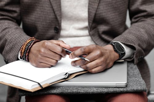 A Stylish  Businessperson Holding a Pen