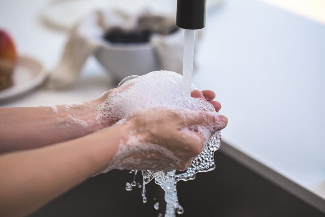 Free Person Washing His Hand Stock Photo