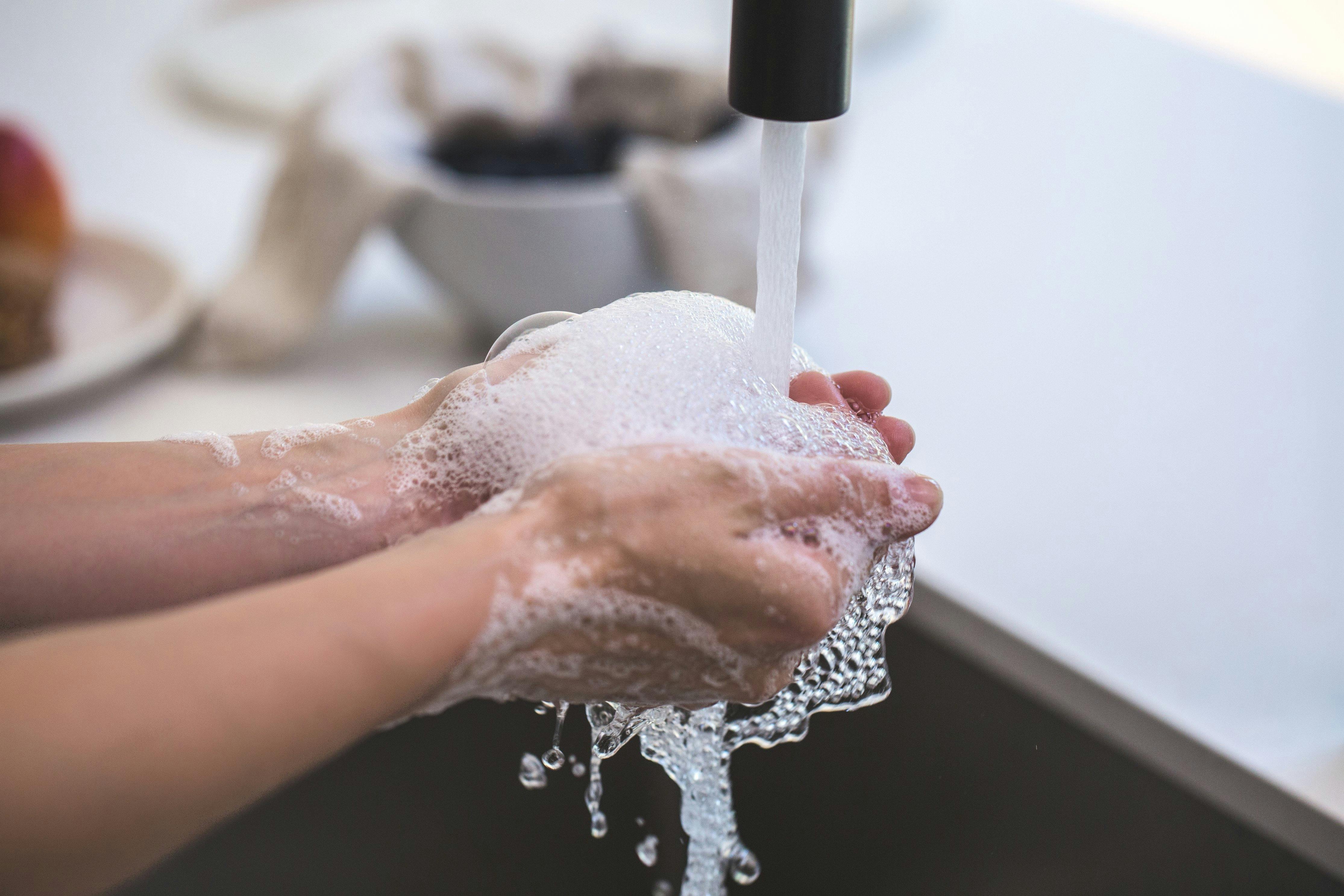 person-washing-his-hand-free-stock-photo