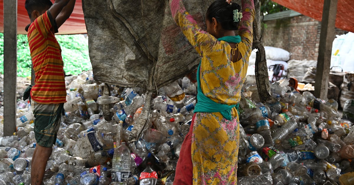 People Piling Up PET Bottles