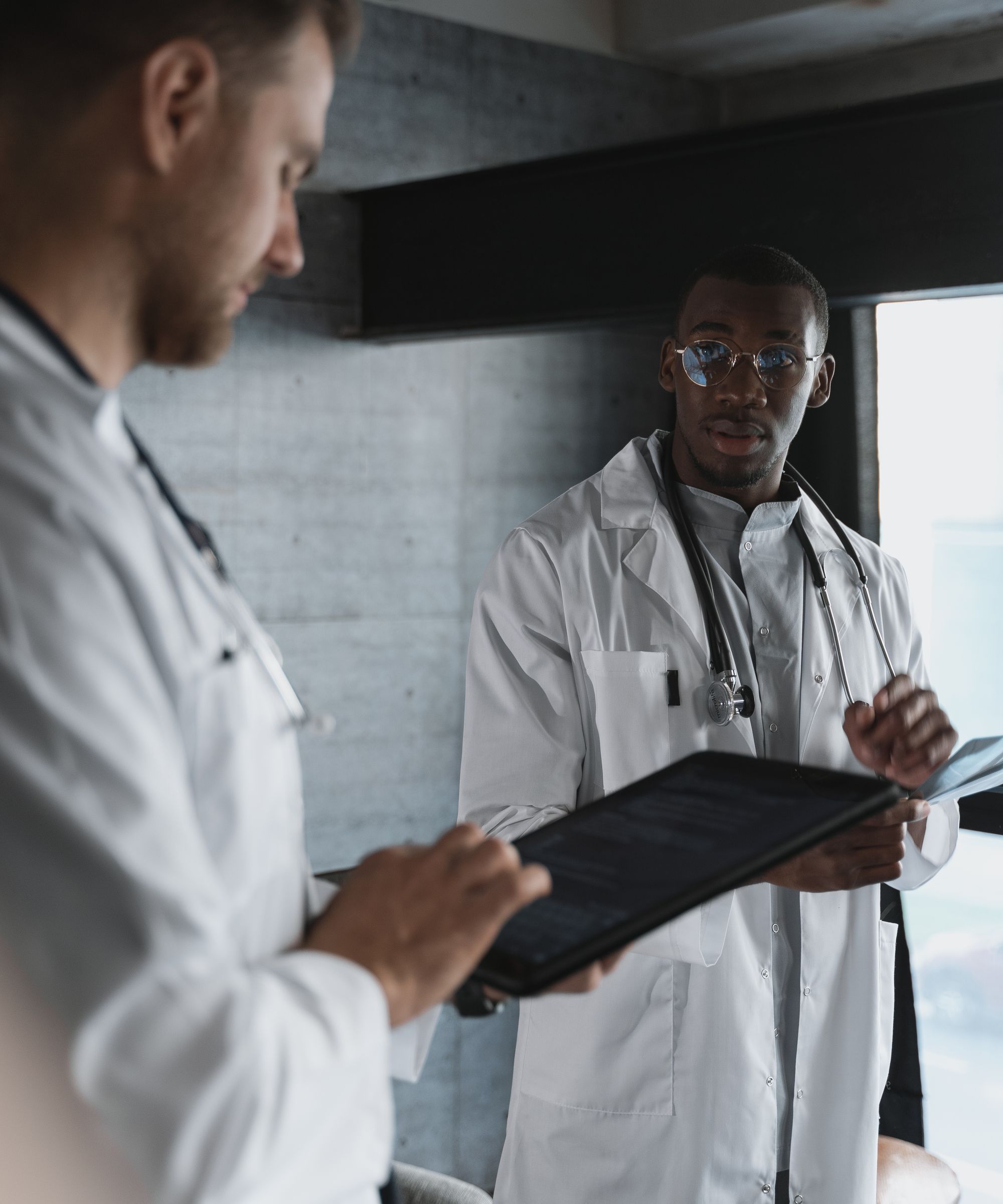 ENT practice team reviewing a patient schedule in a modern office