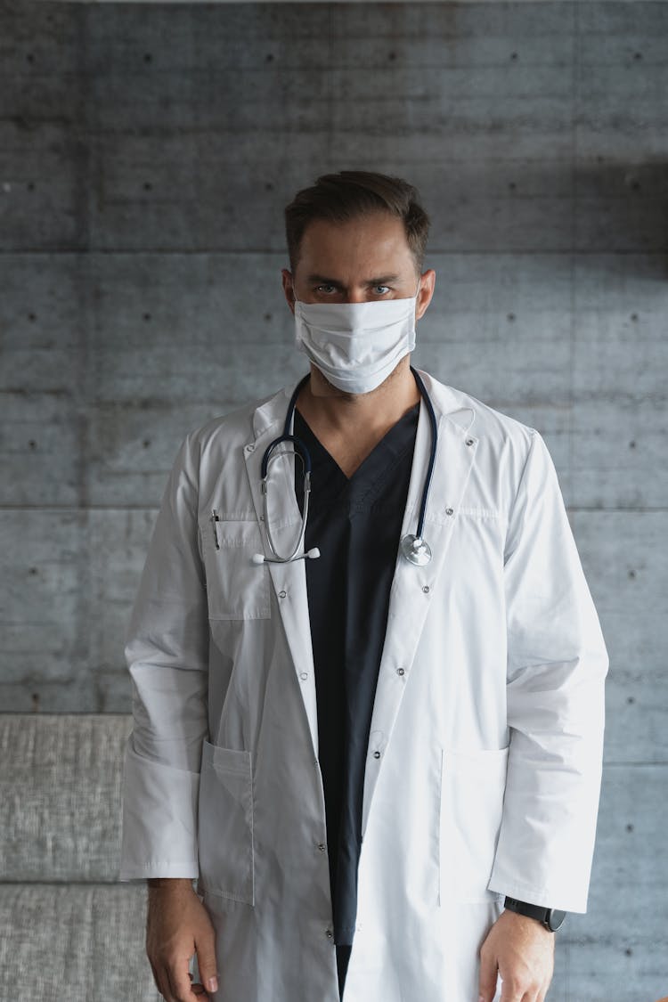 Doctor Wearing A White Face Mask