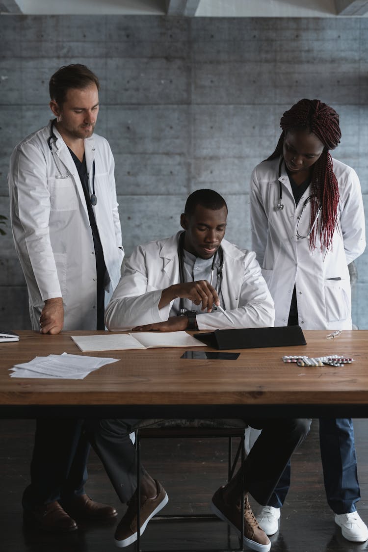 Doctors Working Together On A Research