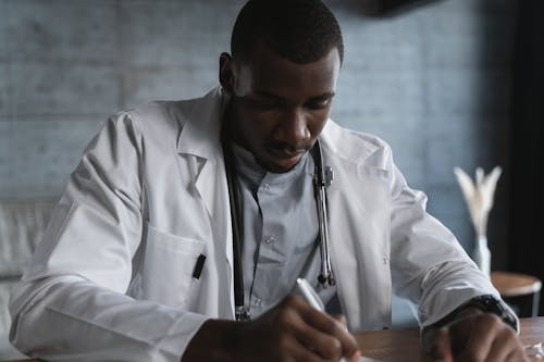 Gratis stockfoto met aan hebben, Afro-Amerikaanse man, arts