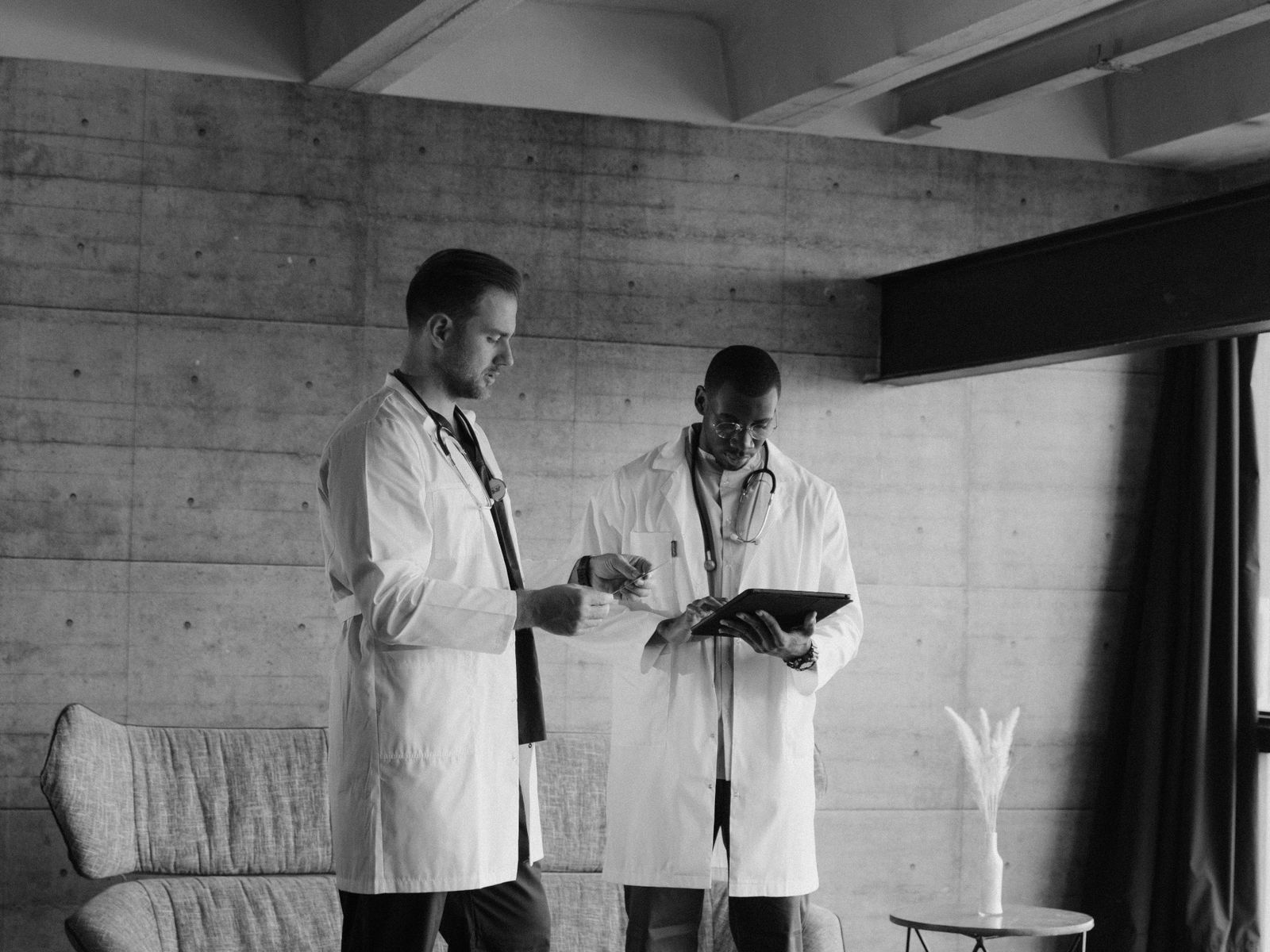 Two doctors collaborating in a modern office