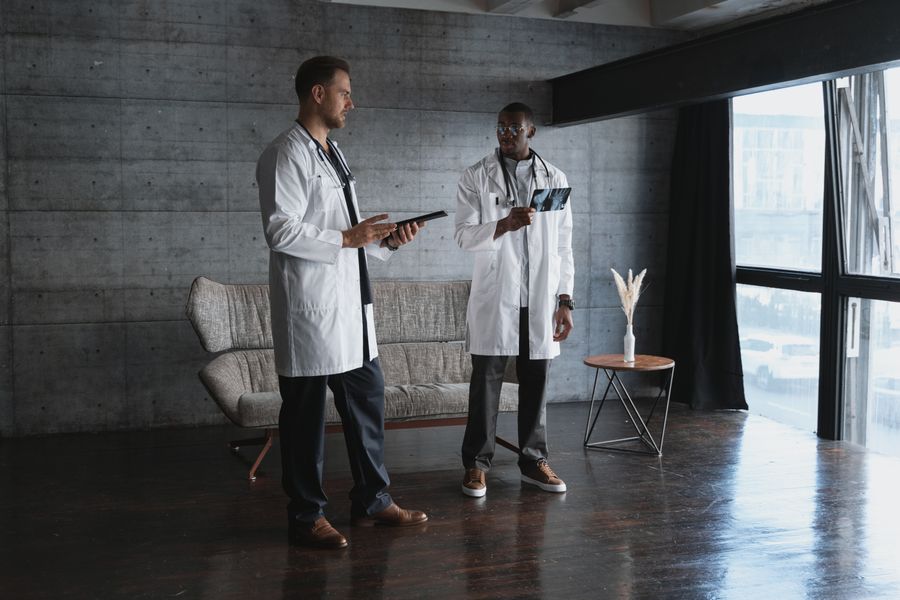 Doctors reviewing an x-ray image on a tablet
