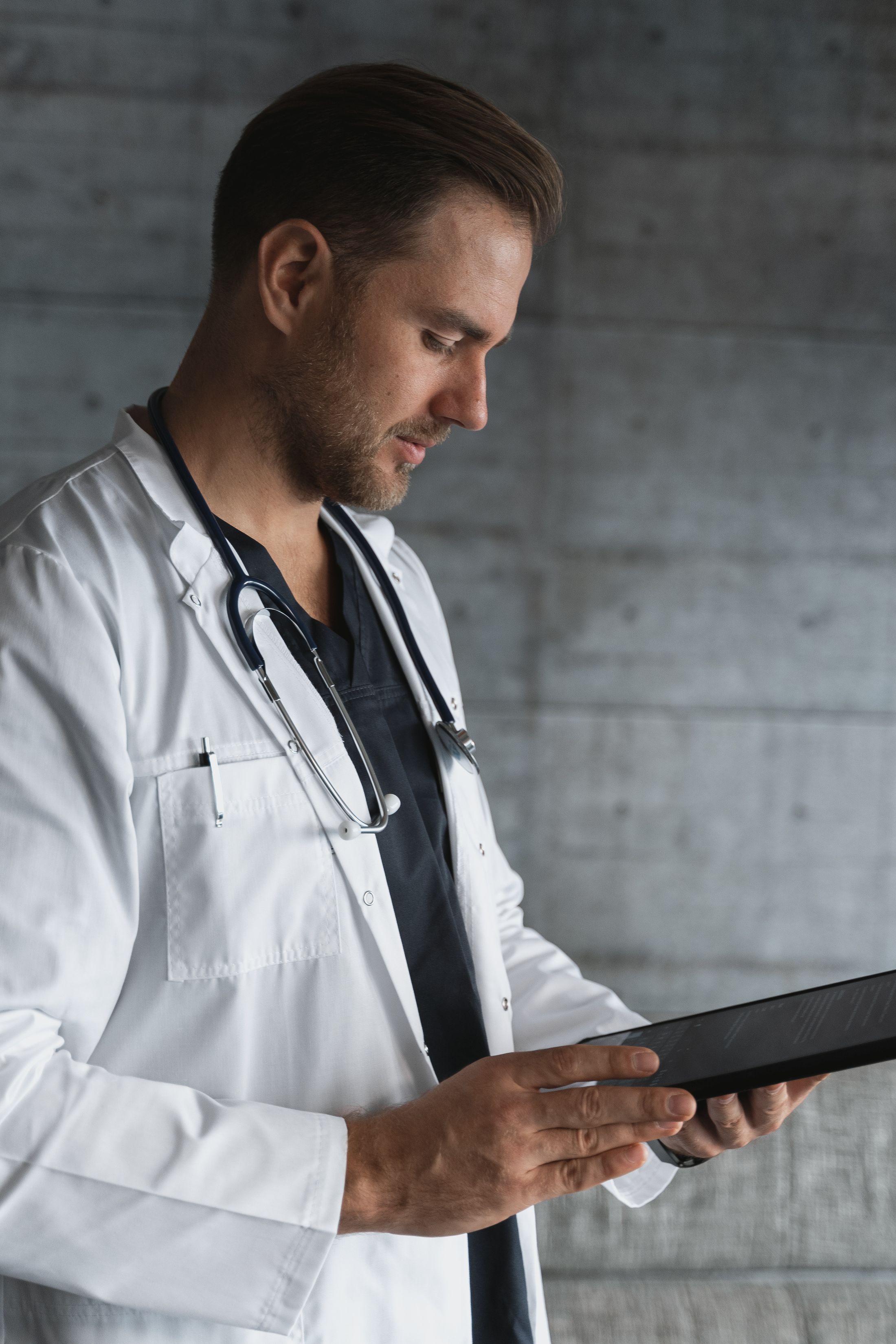 Dermatologist consulting with a patient in a calm private clinic