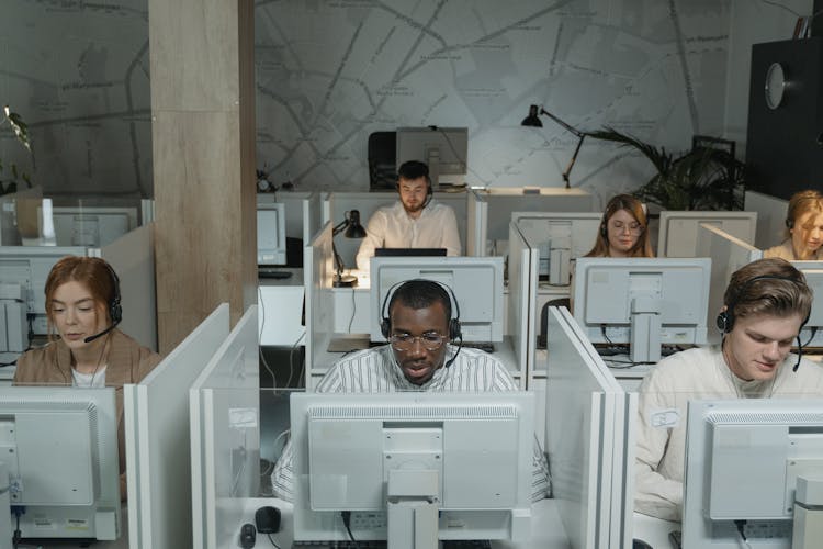 People Working In Call Center Office