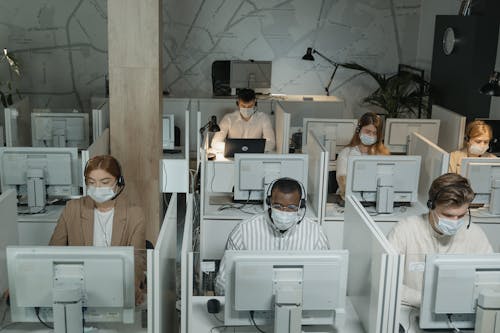 Free People Working on a Call Center Stock Photo
