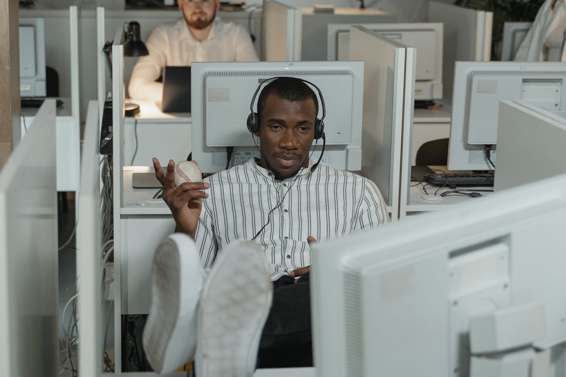 Man wearing headphones in an office