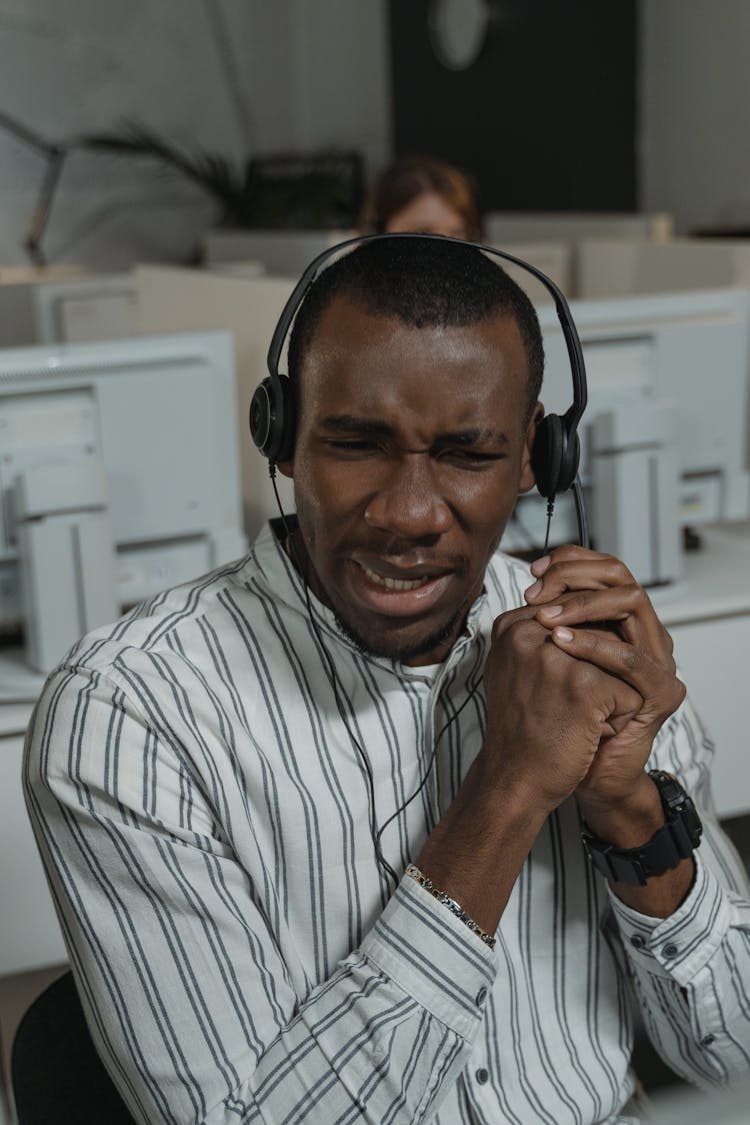 Close-up Photo Of A Busy Call Center Agent 