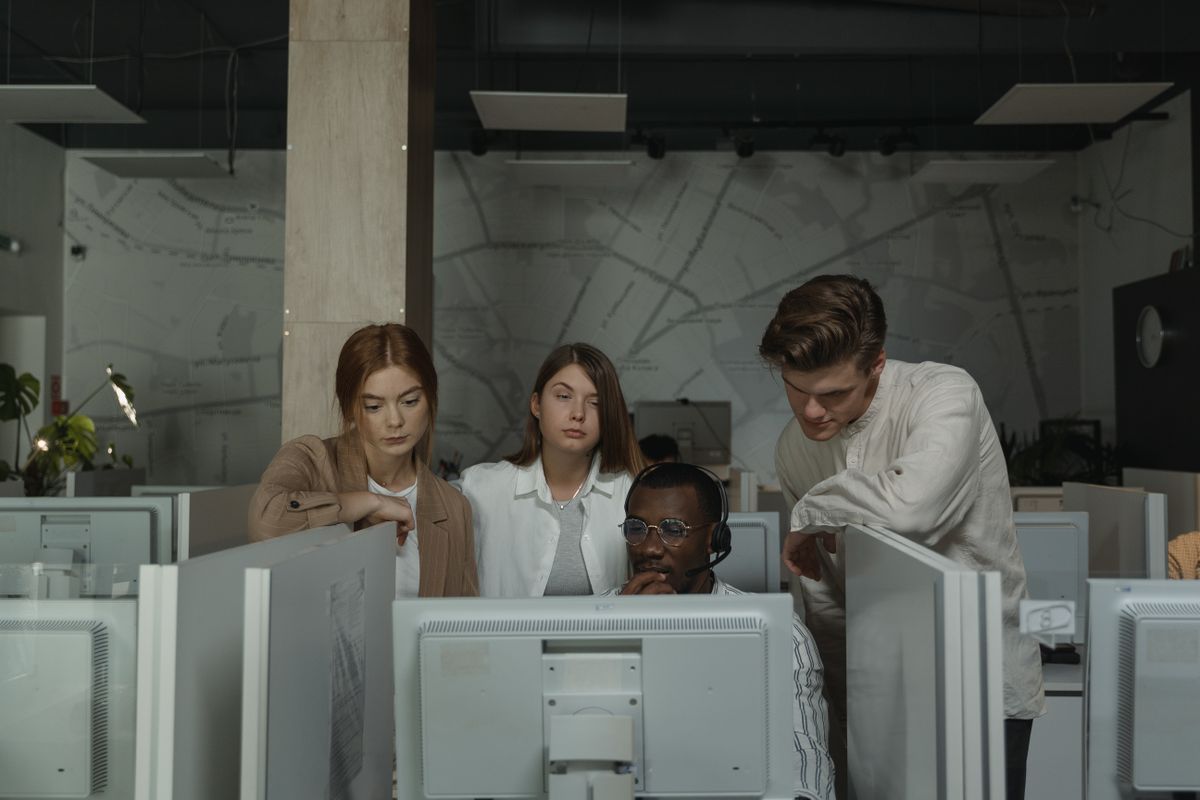 Professionals collaborating in a modern office