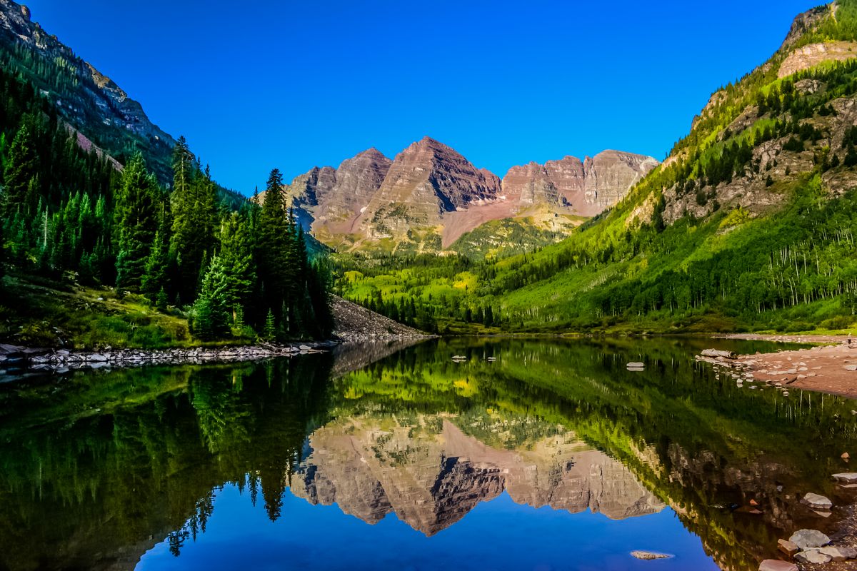 Maroon Bells reflected in a lake near Aspen