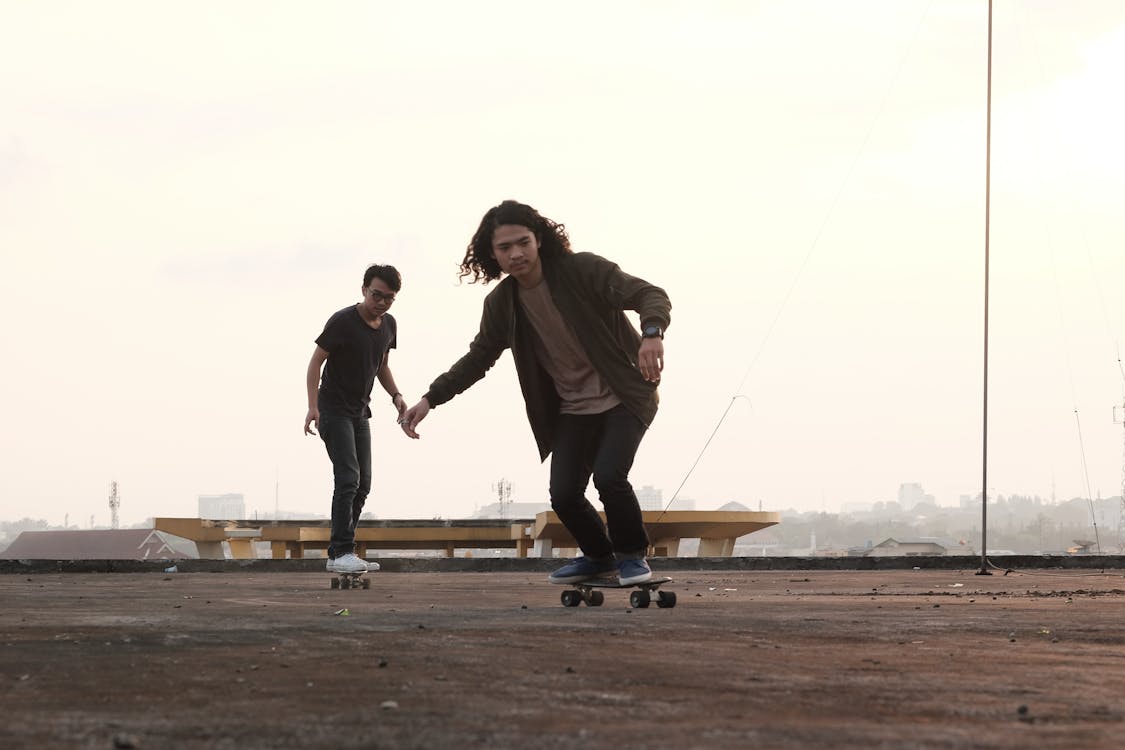 Man Skating on Gray Concrete Surface