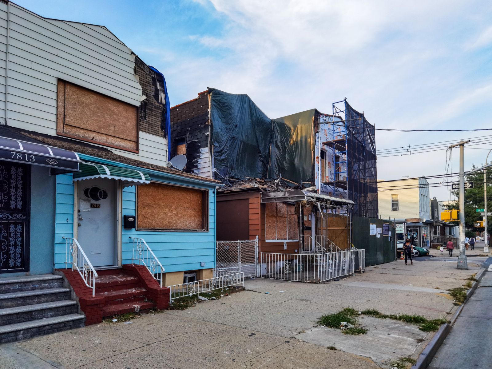 Boarded-up houses on a city street
