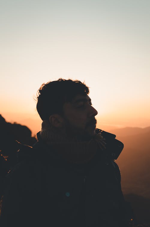 Silhouette of Man during Sunset