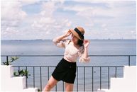 Smiling Woman in Hat