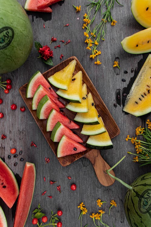 Photo Of Sliced Watermelon On Wooden Chopping Board