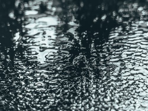 Free Rippled river with drops in rainy weather Stock Photo