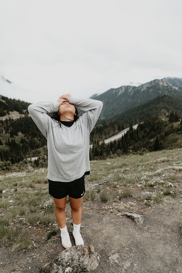 Young Woman Traveler On Mountain Range