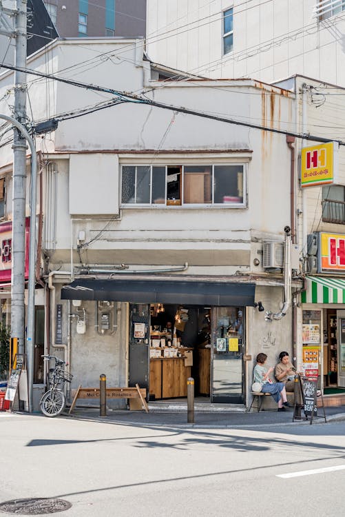 Coffee Shop on the Corner Street · Free Stock Photo