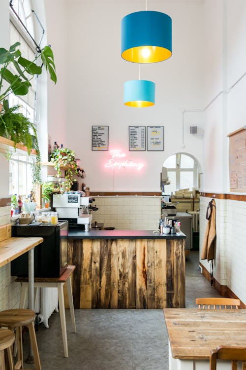 Free A Wooden Themed Eatery with Indoor Plants Stock Photo