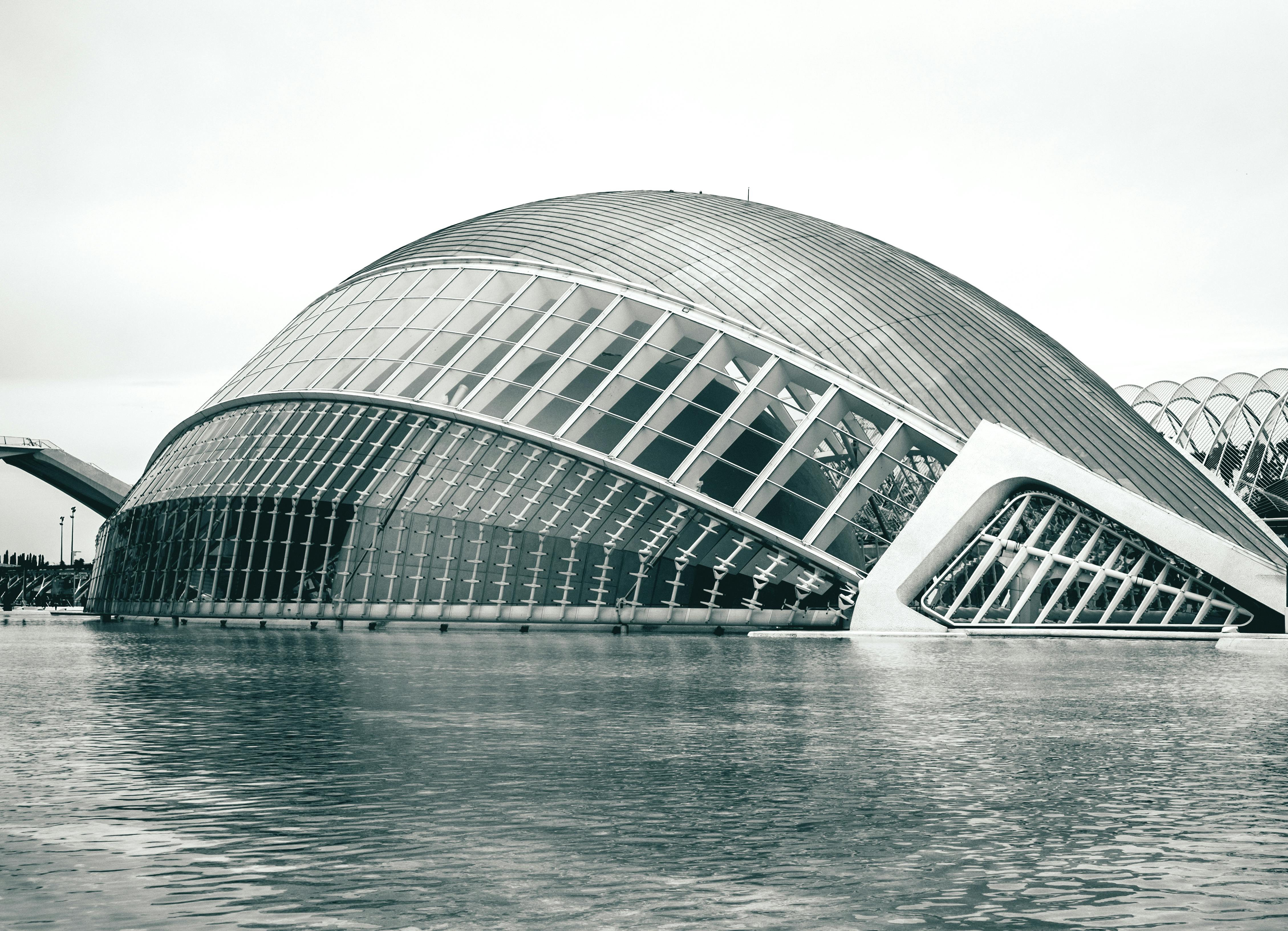 gray concrete building near body of water