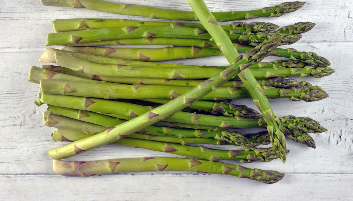 low calorie beef recipe — Fresh Asparagus on Wooden Surface · Free. Photo: Pexels