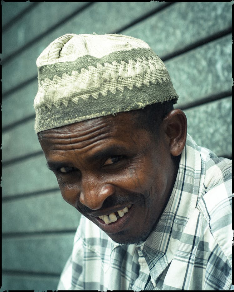 Cheerful Senior Black Man With Bad Teeth Smiling At Camera