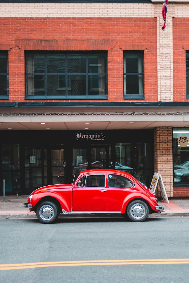 Red Retro Car On Road In City