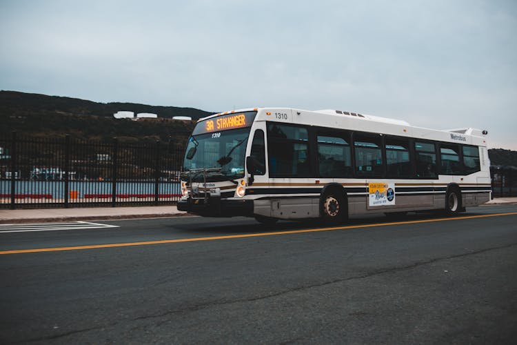 Gray Bus On Asphalt Road