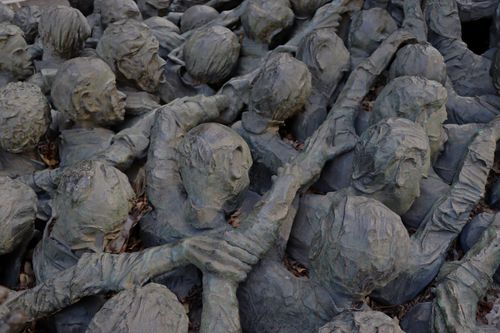 Free A powerful sculpture depicting human figures intertwined, creating a dramatic and evocative scene. Stock Photo