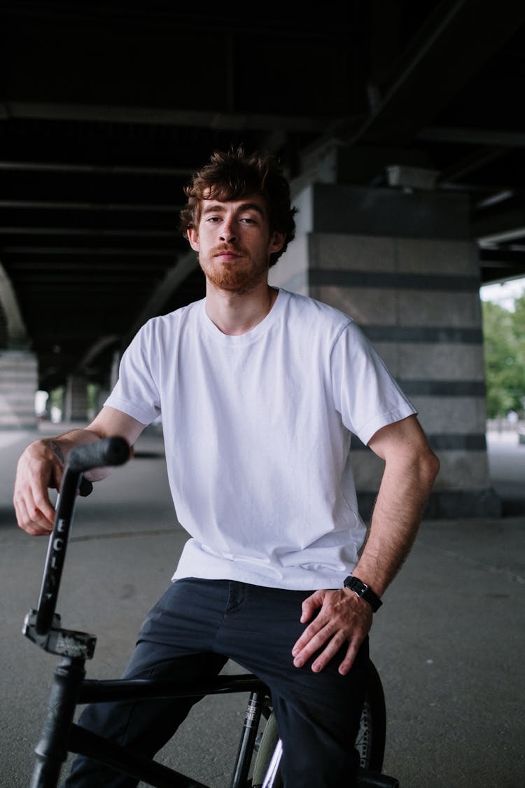 Biker Sitting On His Bike