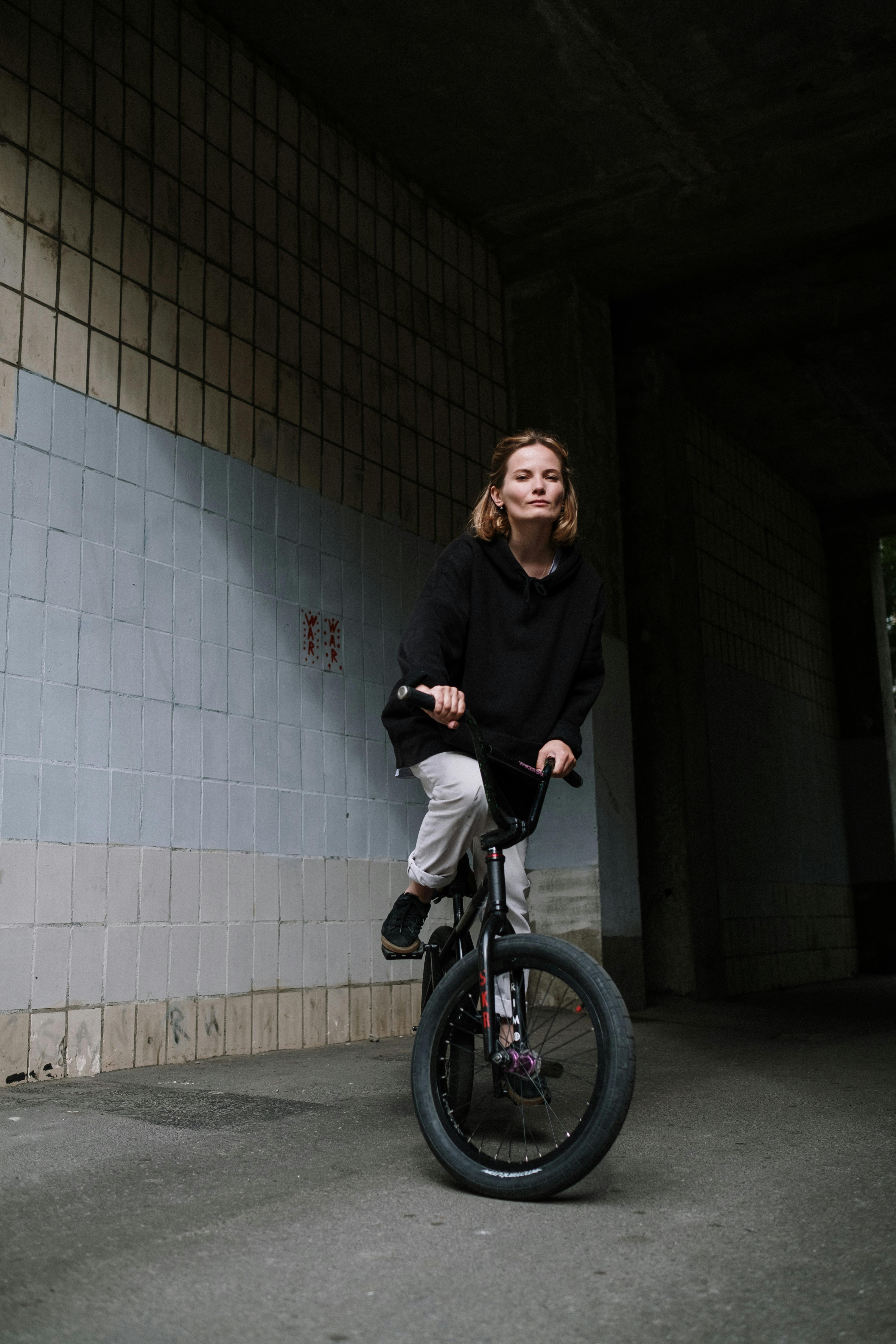 a woman riding a bicycle