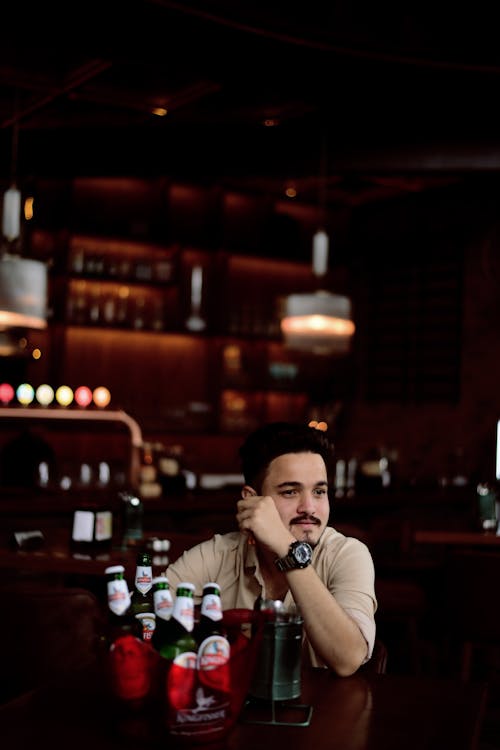 Man Sitting in a Bar