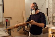 Man in Black Crew Neck T-shirt Wearing White Face Mask