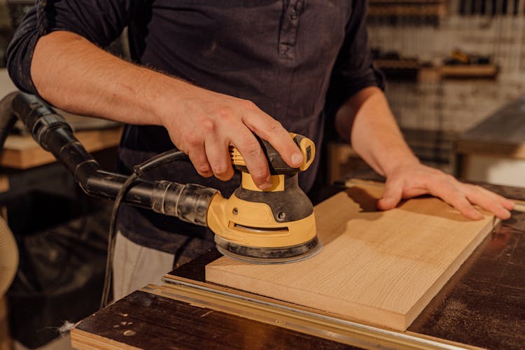 Close-up Of Sanding Wood