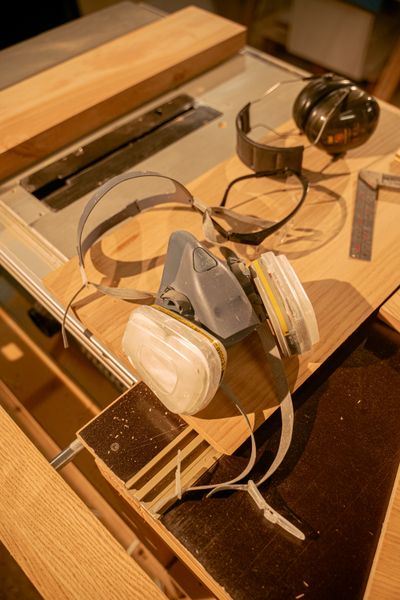 Safety goggles and ear protection in a workshop
